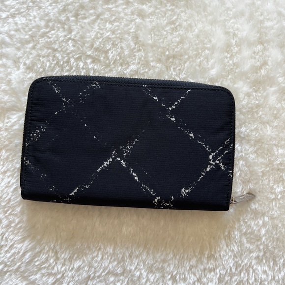 CHANEL Handbags - Authentic Chanel Medium Travel line wallet